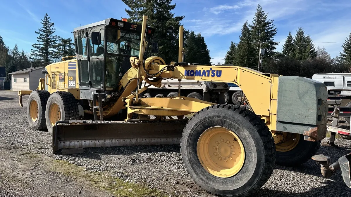 Grader used for road work, driveway leveling, and finish grading